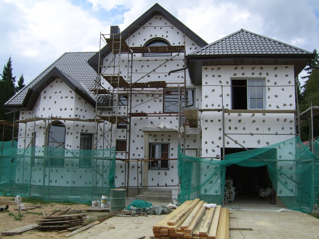 Ремонт фасада загородного дома: от штукатурки до сайдинга